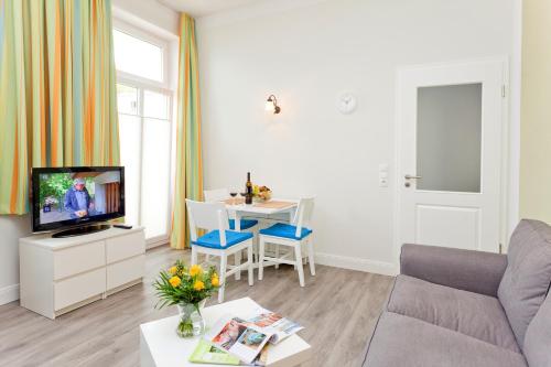 TV a/nebo společenská místnost v ubytování Ferienwohnungen Familie Glasner