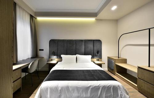 Roomore Apartmentsにあるベッド