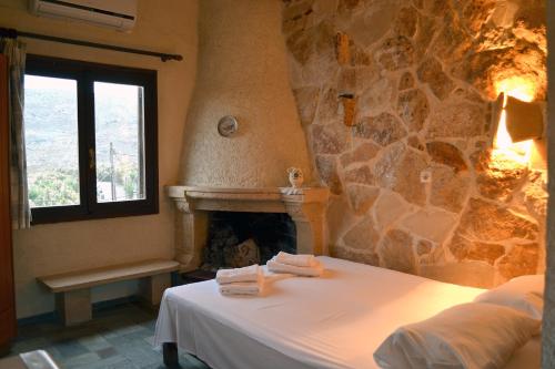 Katil atau katil-katil dalam bilik di Athena Rooms