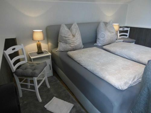 Postel nebo postele na pokoji v ubytování Ferienwohnung _ Ferienzimmer Levsen