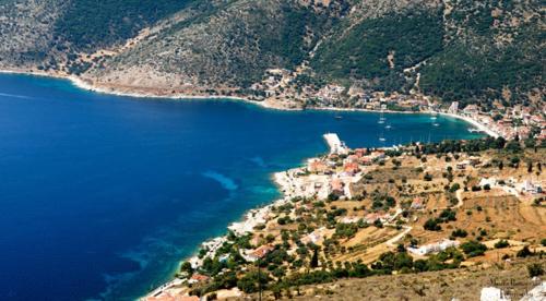 an aerial view of a small island in the water at Evangelia in Ayia Evfimia