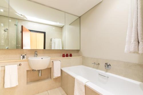 Ett badrum på 207 Raphael Penthouse