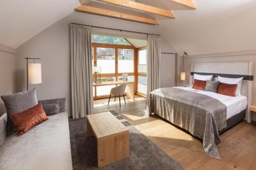 Postel nebo postele na pokoji v ubytování Hotel Goldene Sonne