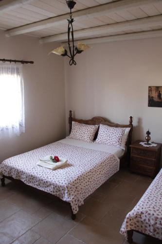 Letto o letti in una camera di *Villa Pap-Live the Greek hospitality in a village*
