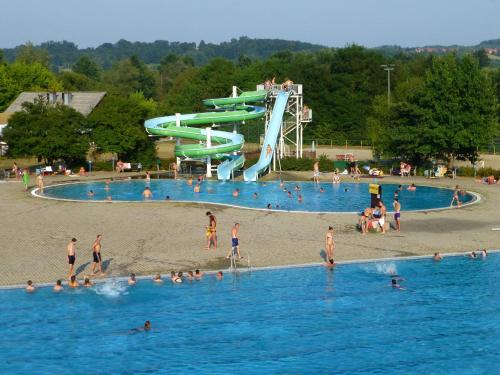 a group of people in the water at a water park at Thermal SPA Marija in Topusko