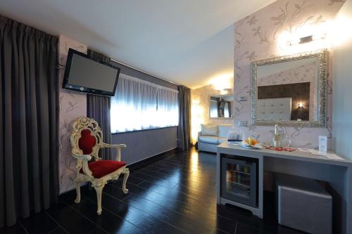 TV a/nebo společenská místnost v ubytování Hotel Relax Roma Nord