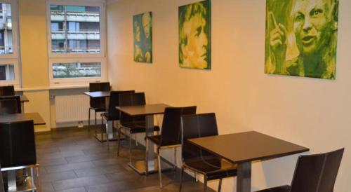 Ein Restaurant oder anderes Speiselokal in der Unterkunft Plaza Inn Salzburg City 