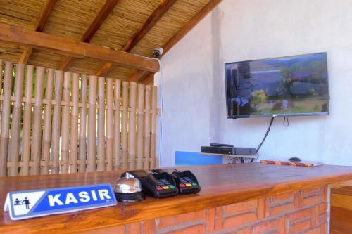 A television and/or entertainment centre at Alden Beach House