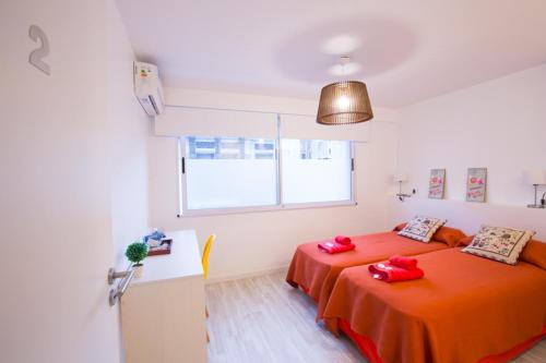 Ένα ή περισσότερα κρεβάτια σε δωμάτιο στο Amazing Studio Apartment