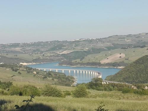 a view of a reservoir with a bridge in the distance at B&B Il Belvedere in Guardialfiera
