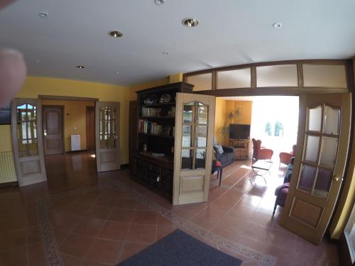 a room with a living room with a couch and chairs at Dunas de Oyambre in Comillas