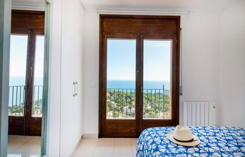 Postel nebo postele na pokoji v ubytování Panorama Costa Brava