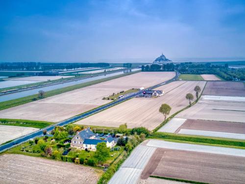 an aerial view of a large field with a runway at Les Vieilles Digues in Beauvoir