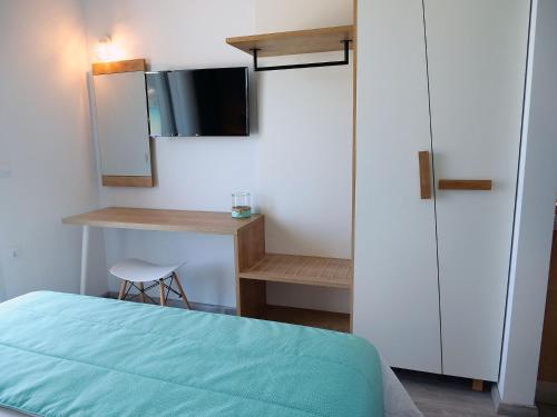 Katil atau katil-katil dalam bilik di Anemoessa Elegant Apartments