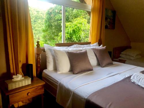 מיטה או מיטות בחדר ב-Mountain Lodge