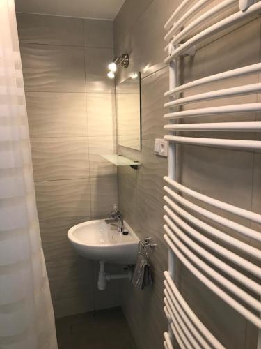 Kúpeľňa v ubytovaní Heni Apartment