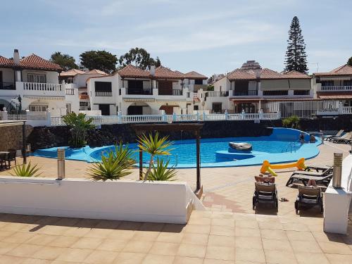 Bazén v ubytování PLAYA LAS AMERICAS PARAISO ROYAL nebo v jeho okolí