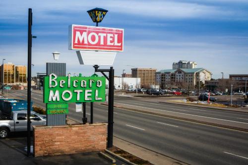 a motel sign on the side of a road at Belcaro Motel in Denver