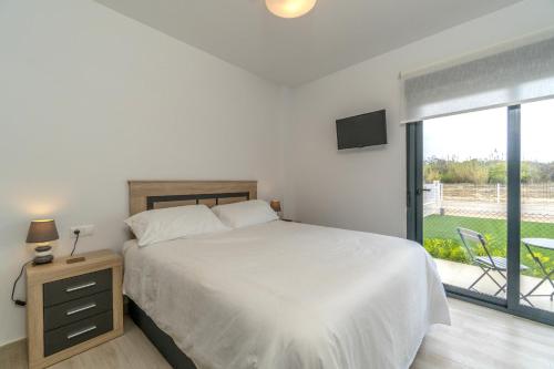 Posteľ alebo postele v izbe v ubytovaní Luxury Pinada Beach