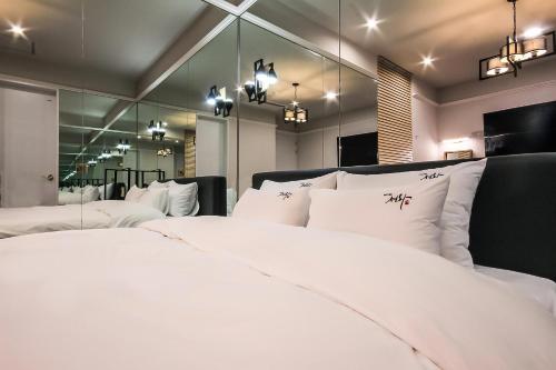 Tempat tidur dalam kamar di Hotel Seowa