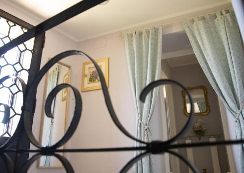 a view of a bedroom with a mirror at Villa Laura in Savoca 