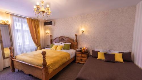 Postel nebo postele na pokoji v ubytování Hermannstadt House 1