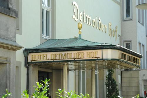 a hotel sign on the front of a building at Hotel Detmolder Hof in Detmold