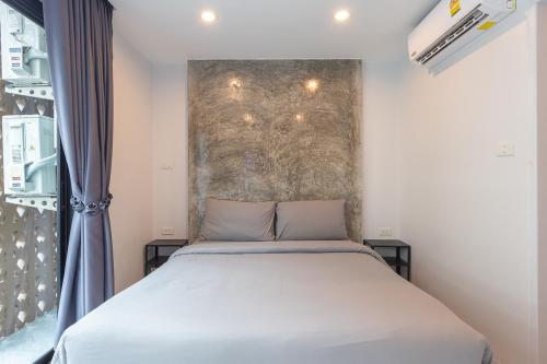 Cama o camas de una habitación en Minimal House Patong