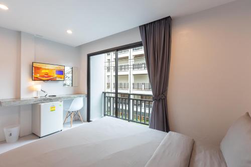 Cama o camas de una habitación en Minimal House Patong