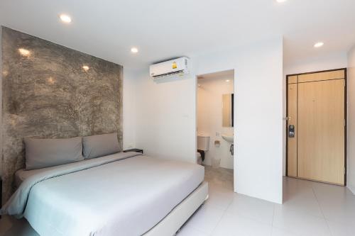 Cama o camas de una habitación en Minimal House Patong