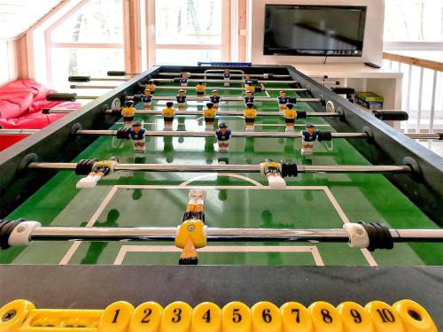 a table with billiard balls on top of it at Ferienpark Bad Saarow in Bad Saarow