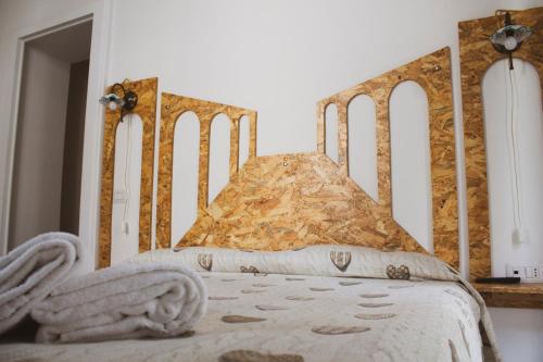 Postel nebo postele na pokoji v ubytování Grande borgo