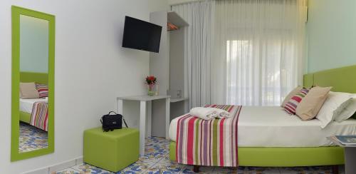 San Domenico Accommodation Maiori tesisinde bir odada yatak veya yataklar