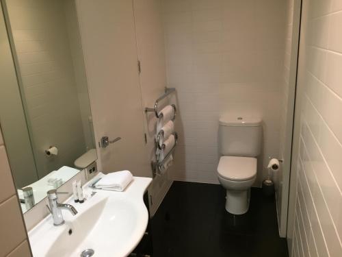 Kylpyhuone majoituspaikassa Museum Apartment