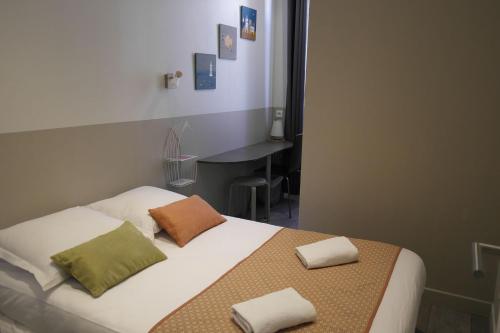 Cama o camas de una habitación en Le Cassiden