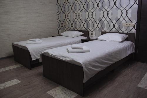Кровать или кровати в номере Автоград мотель