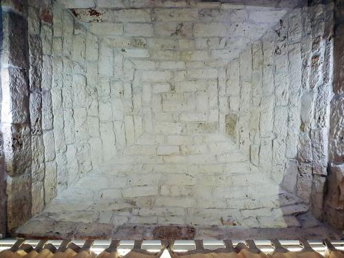 a stone wall with a staircase in a building at BiancoAmore OSTUNI - the sky, the sea, the love - in Ostuni