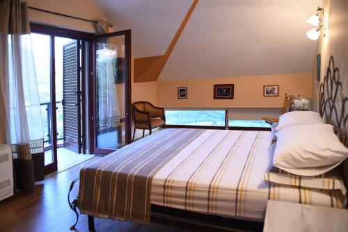 #IoniaHouse Surrel Villa tesisinde bir odada yatak veya yataklar