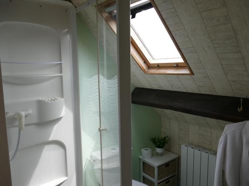 Ванна кімната в Chambres d'Hôtes Les Vieilles Digues