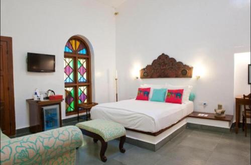 Cama o camas de una habitación en Purity at Lake Vembanad