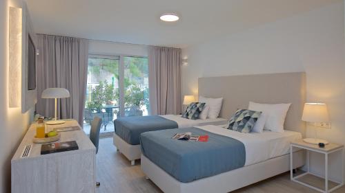 Postel nebo postele na pokoji v ubytování Scardona Park Luxury Accommodation