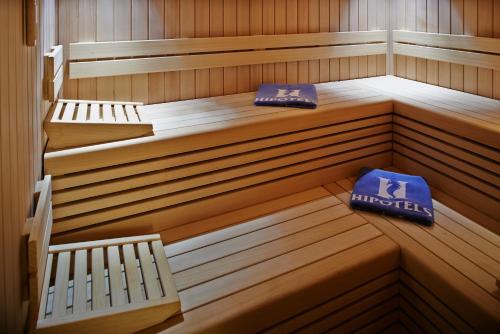 an inside of a sauna with two benches at Hipotels Coma Gran in Sa Coma