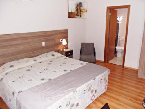 Katil atau katil-katil dalam bilik di Apart Hotel Acrópolis