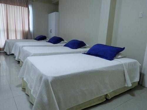 Cama o camas de una habitación en Hotel Santa Fe