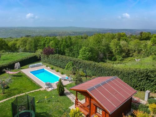 an aerial view of a garden with a swimming pool at Apartment Daria by Interhome in Labin