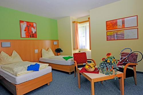 Ein Bett oder Betten in einem Zimmer der Unterkunft Austrian Sports Resort, BSFZ Obertraun