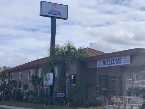 a welcome sign in front of a building at Buena Park Inn in Anaheim