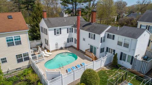 an aerial view of a house with a swimming pool at Holiday Guest House Bed & Breakfast in Wells