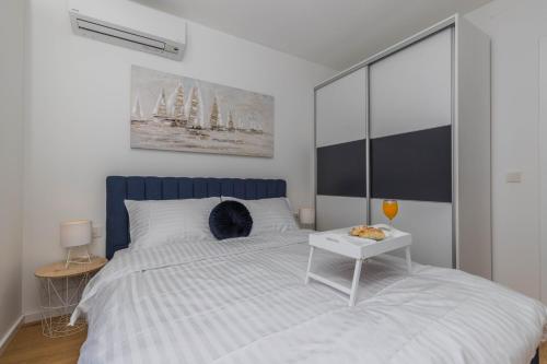 Posteľ alebo postele v izbe v ubytovaní Apartments Ines