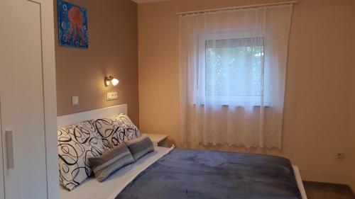 A bed or beds in a room at TimiBá